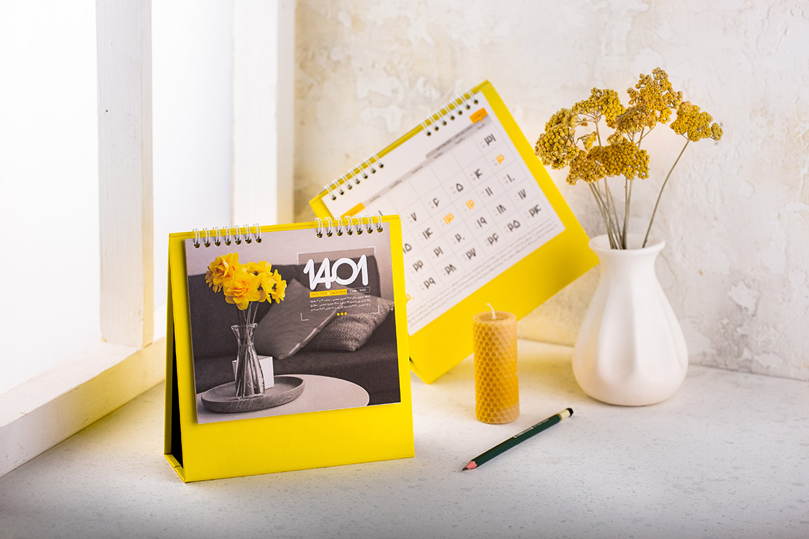 تقویم رومیزی 1401 زرد و مشکی
